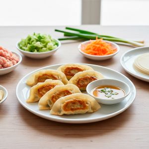 GYOZA DE POLLO Y VERDURAS "ASIAN BITES" 18/22gr BOLSA 600gr (CAJA 6 BOLSAS)